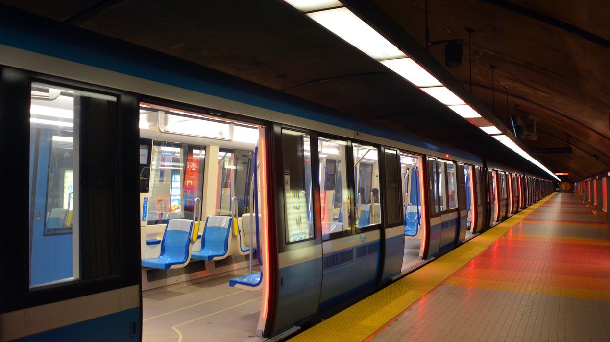 An empty metro train and platform.