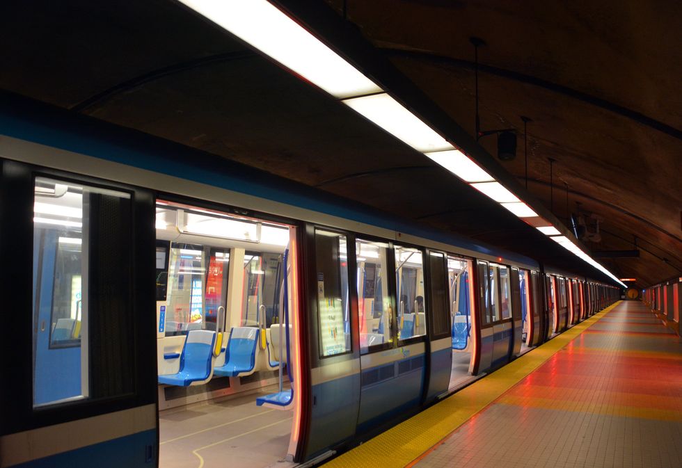 An empty metro train and platform.