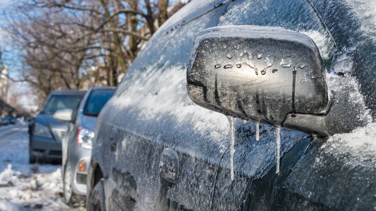An ice-covered car on a Montreal street.
