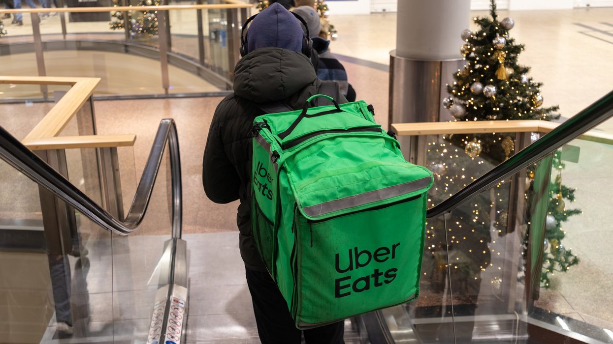 An Uber Eats delivery person.