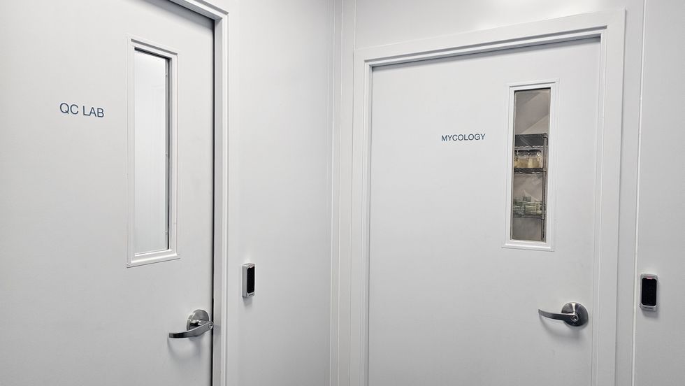 Behind the lab door labeled "Mycology" is where Cubed selects and propogates spores.