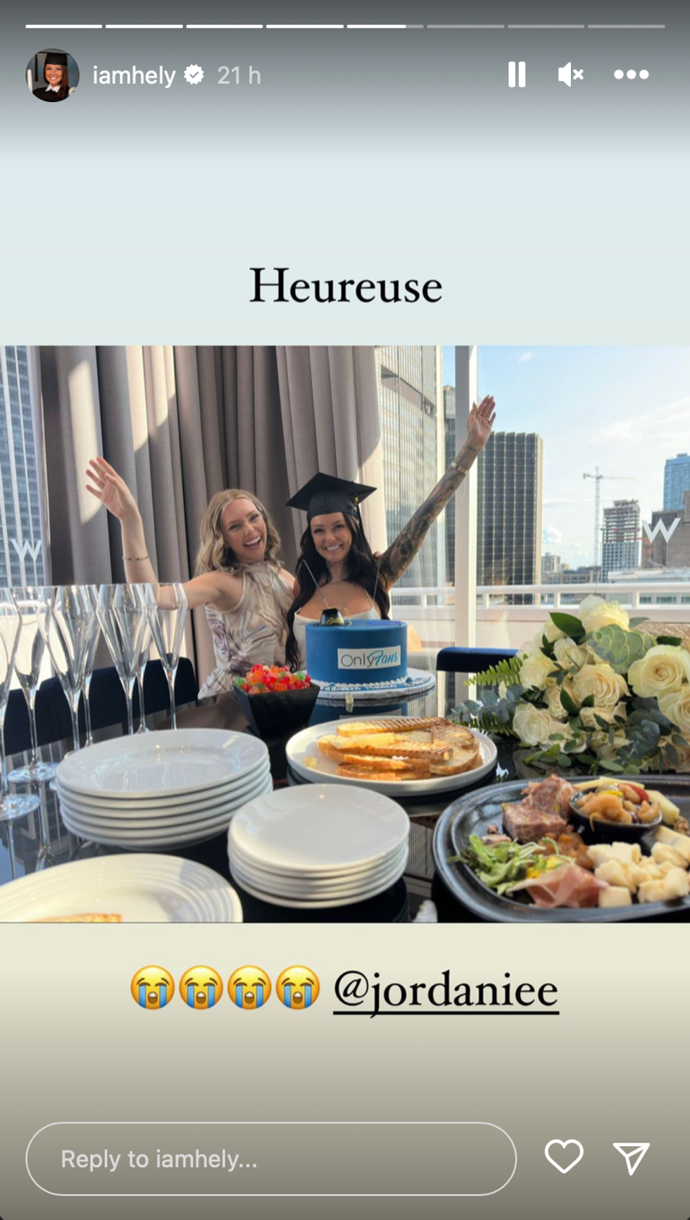 Boudreau celebrates over snacks and an OnlyFans-branded cake.