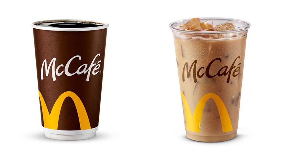 Brown \u200bpaper cup with McCaf\u00e9 Premium Roast Hot. Right: A plastic cup with McCaf\u00e9 Iced Coffee.