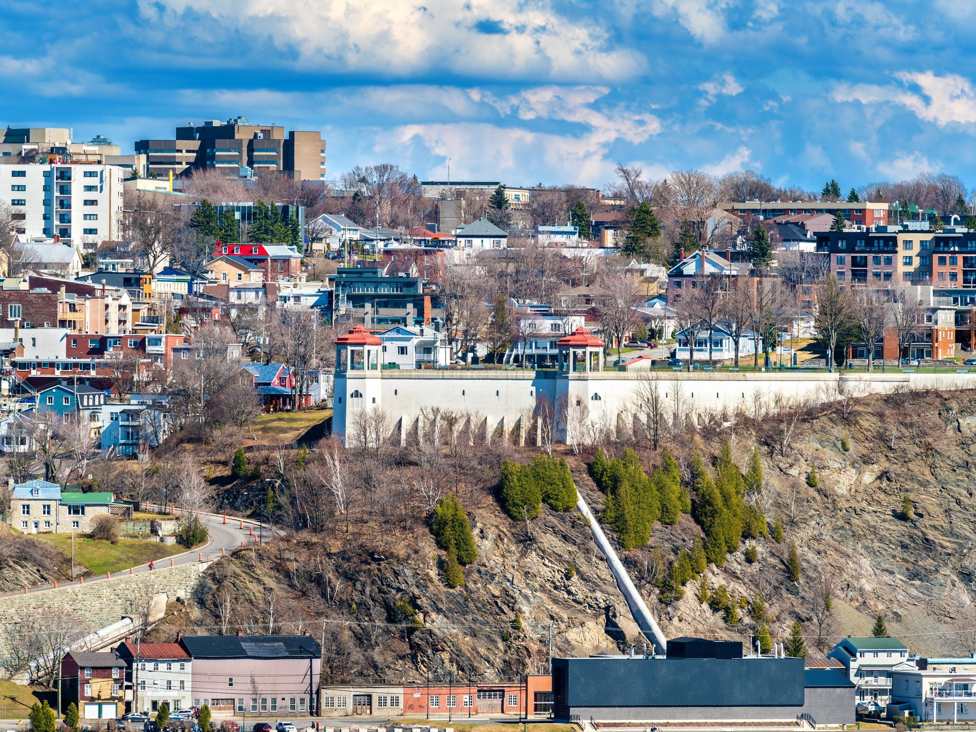 Buildings along a hillside.