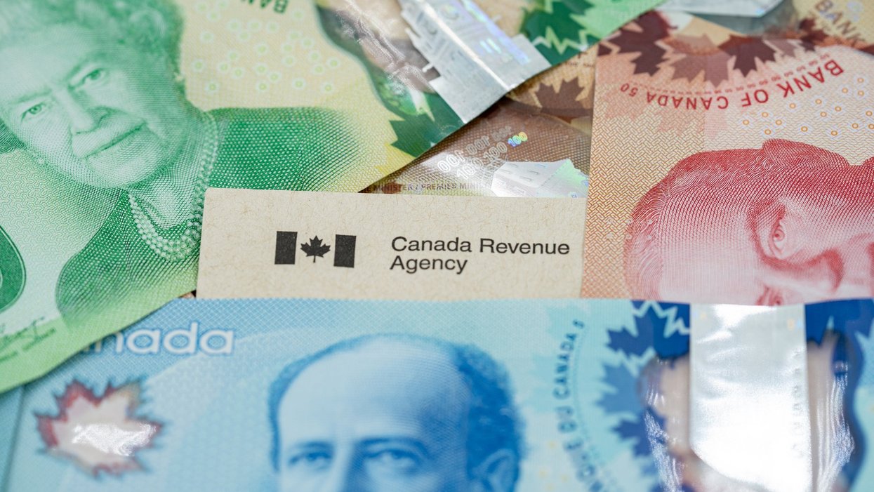 Canada revenue agency envelope with money.