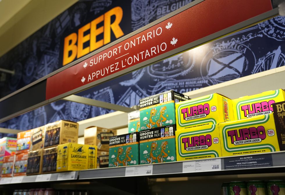 Canadian alcohol with a "support Ontario" sign at an LCBO store.
