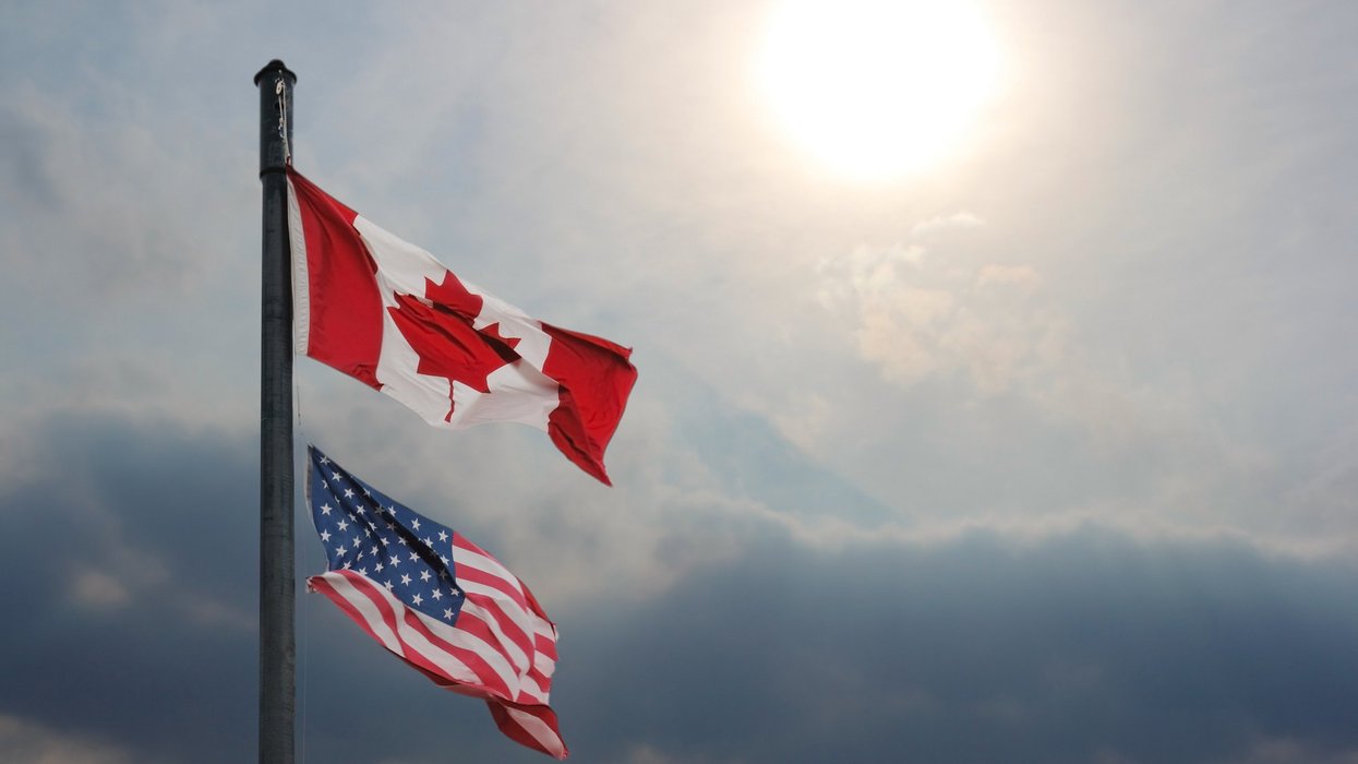 Canadian and American flags (Canada and USA).