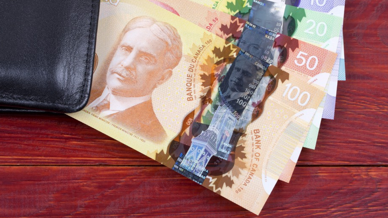 Canadian money displayed on a table.