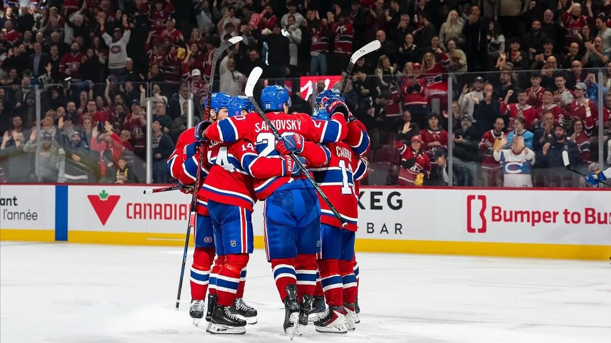 Canadiens players celebrate a goal.