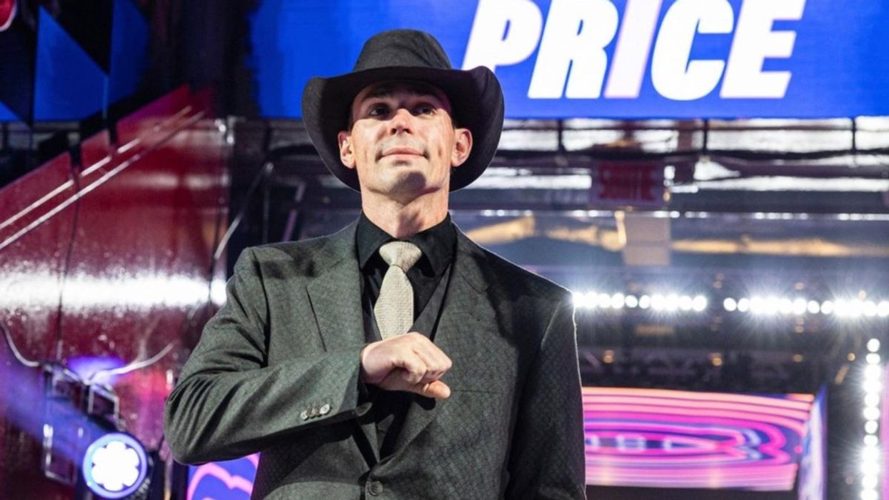 Carey Price wearing a black suit and cowboy hat.