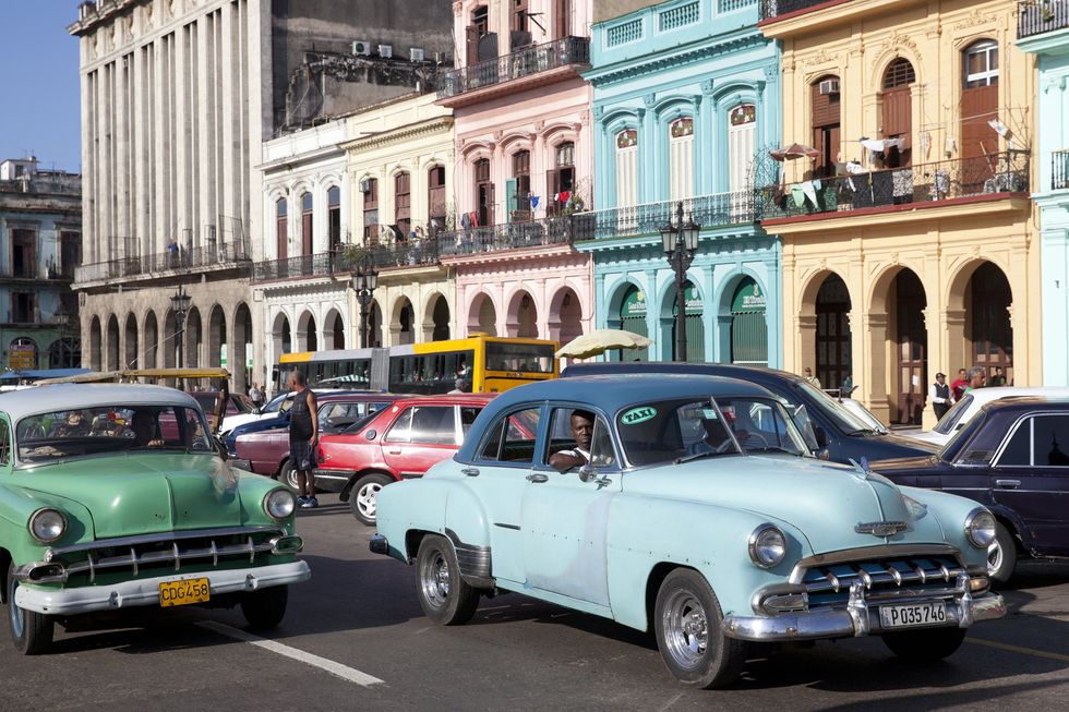Classic cars on the road in Havana, Cuba.