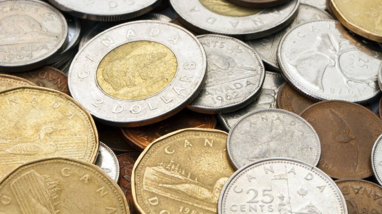 Close up of a pile of modern Canadian coins.