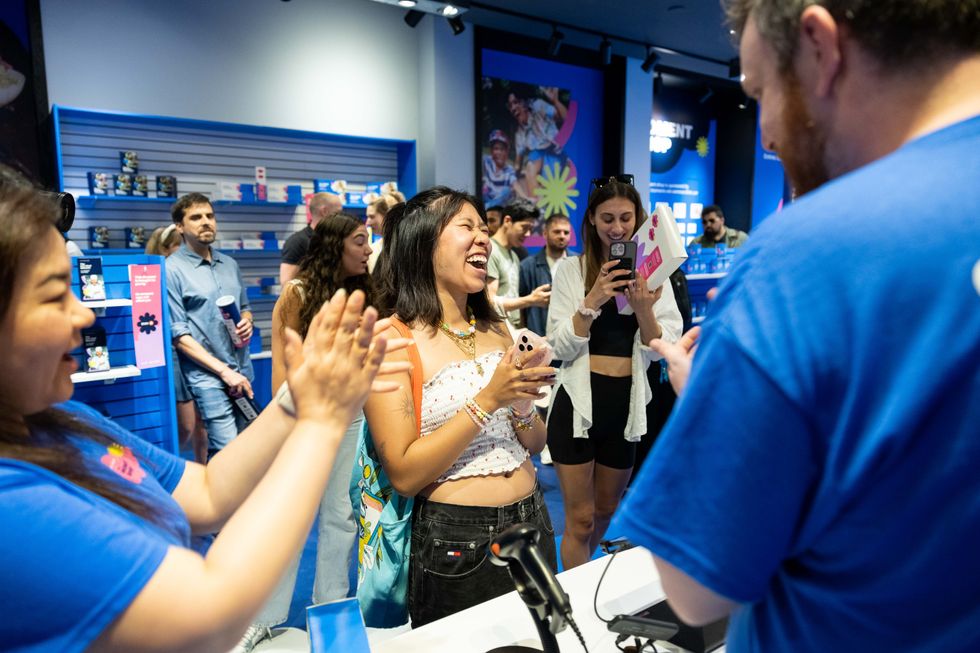 Collectors celebrate at The Moment Shop by AIR MILES. 