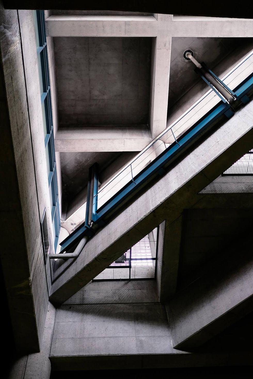 Concrete beams on the ceiling of a Montreal metro station.