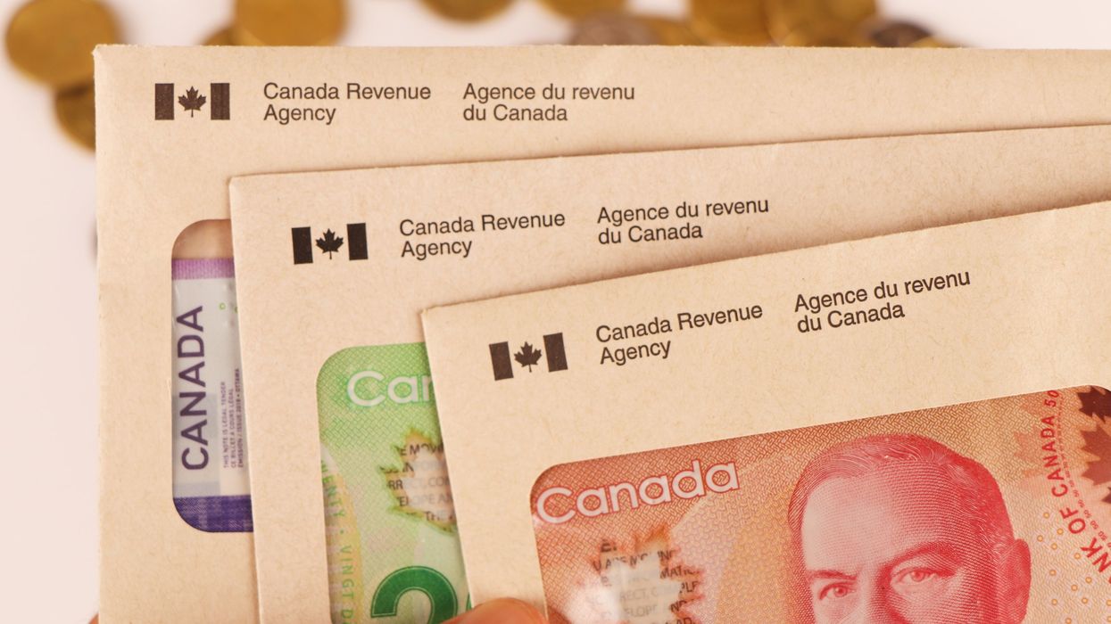 CRA envelopes and Canadian cash (illustrative).
