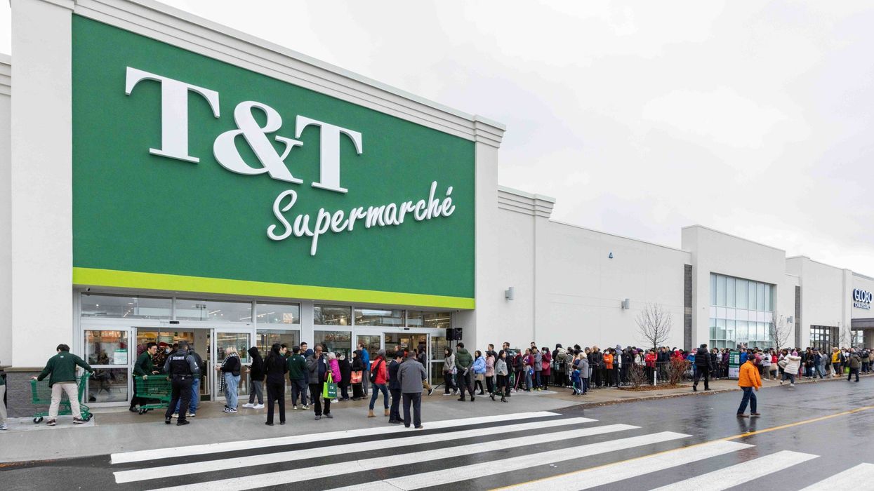 Customers line up on opening day at the new Brossard T&T.