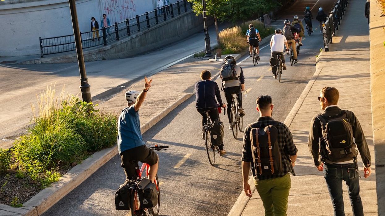 Cyclists ride on a bike path on Montreal's boulevard Saint-Laurent.