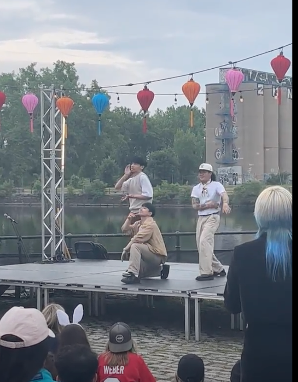 Dance troupe The Archive performs a set on the stage.