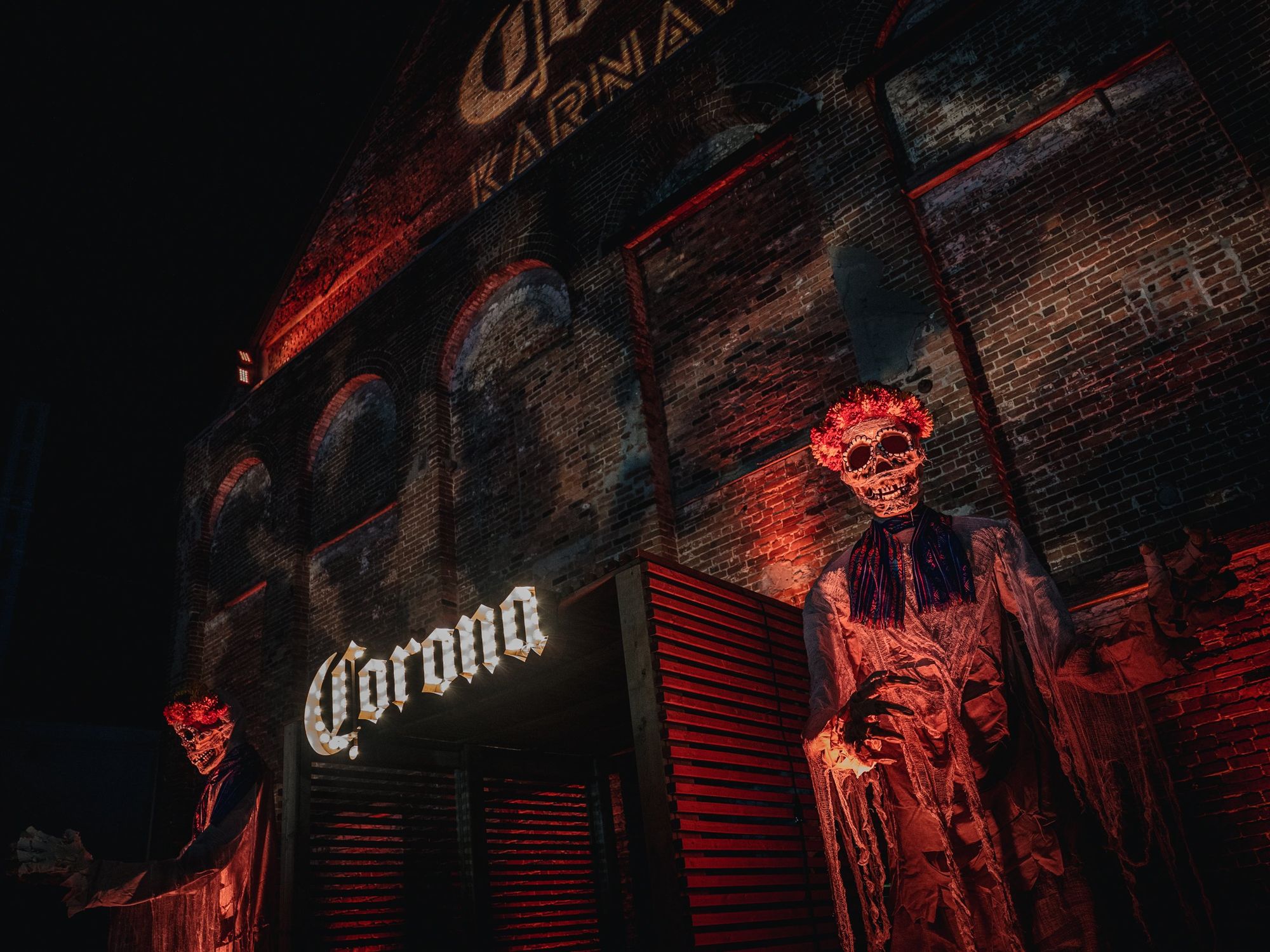 Day of the Dead themed skeletons outside the entrance to New City Gas.