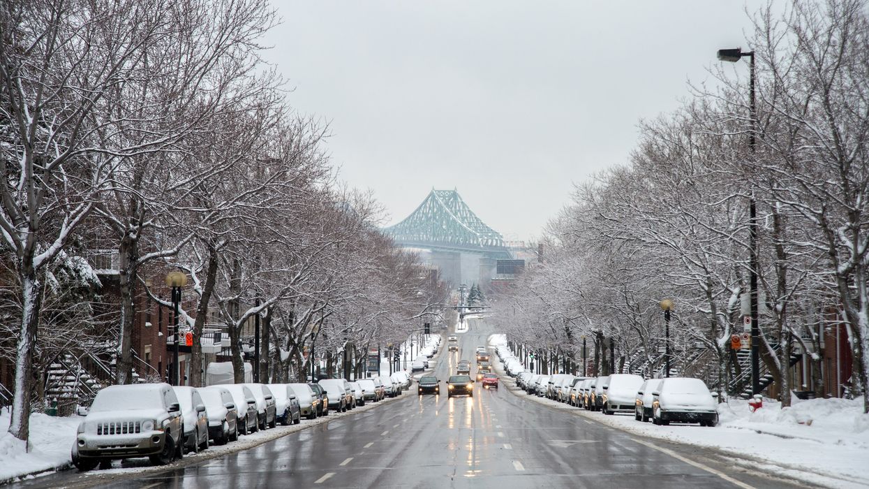 De Lorimier Avenue and Jacques Cartier Bridge during a snow storm.