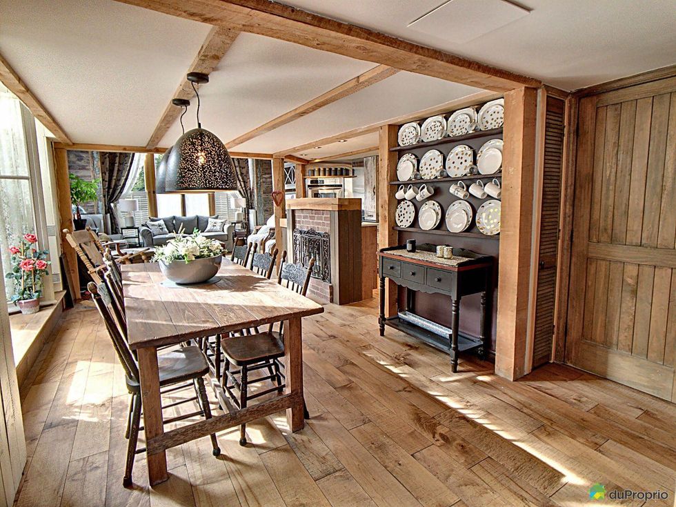 Dining and living rooms of a renovated condo in the Vieux-Port of Quebec City.