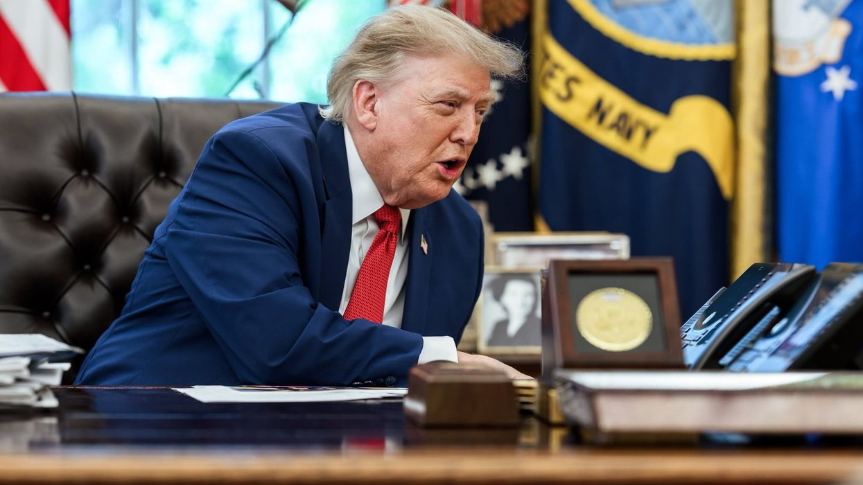 Donald Trump yelling into a phone.