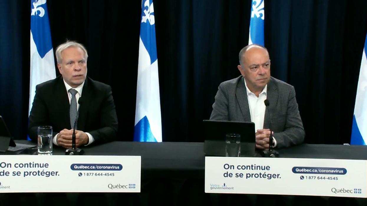 Dr. Luc Boileau and Minister Christian Dubé at a press conference.