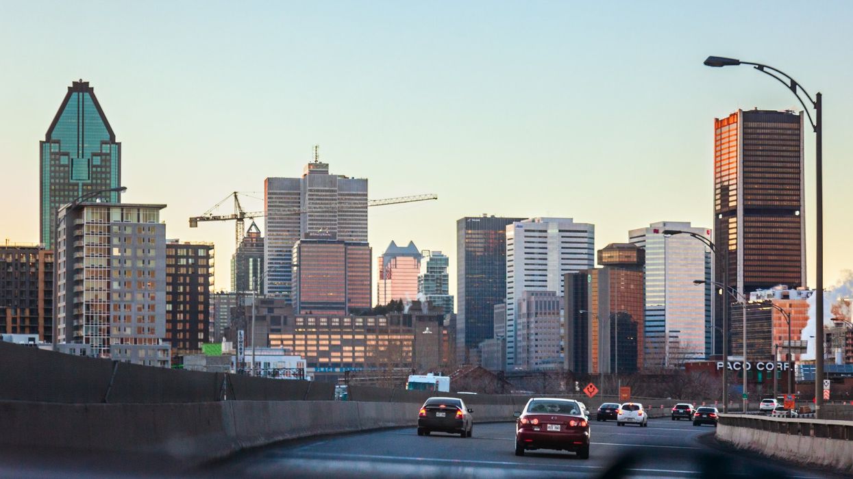 Evening in downtown Montreal, early sunset. Road view.