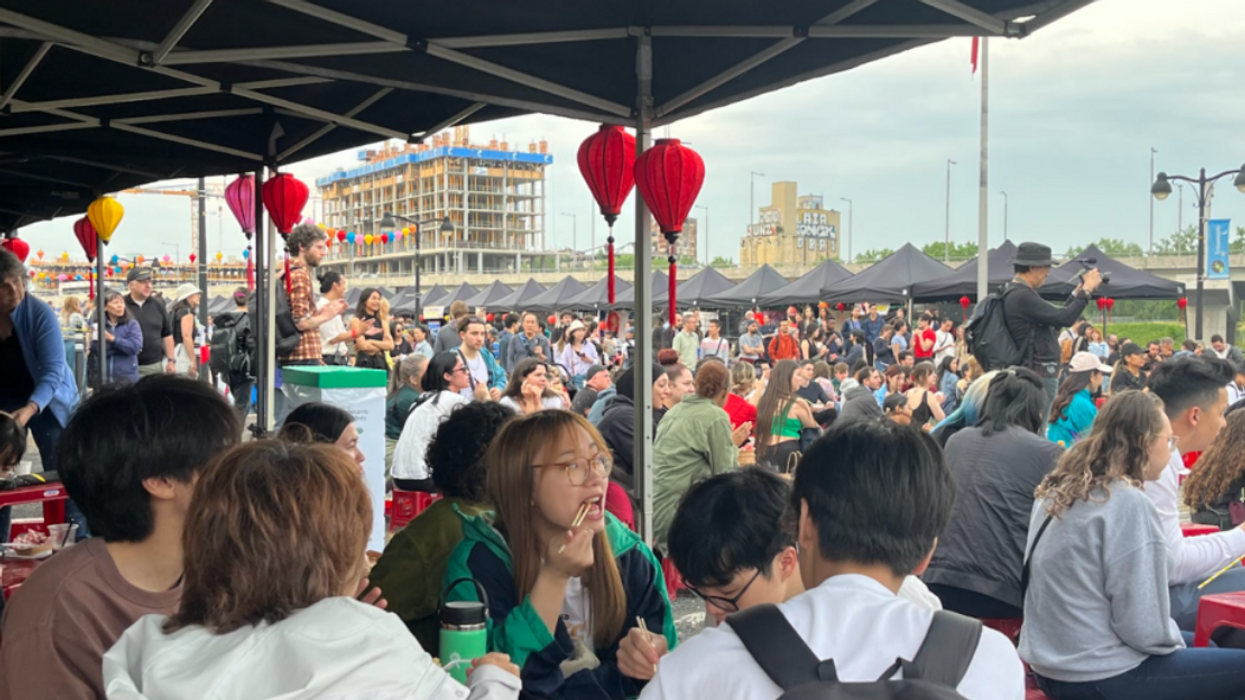 Festival attendees gather to watch performances at Chợ Đêm.
