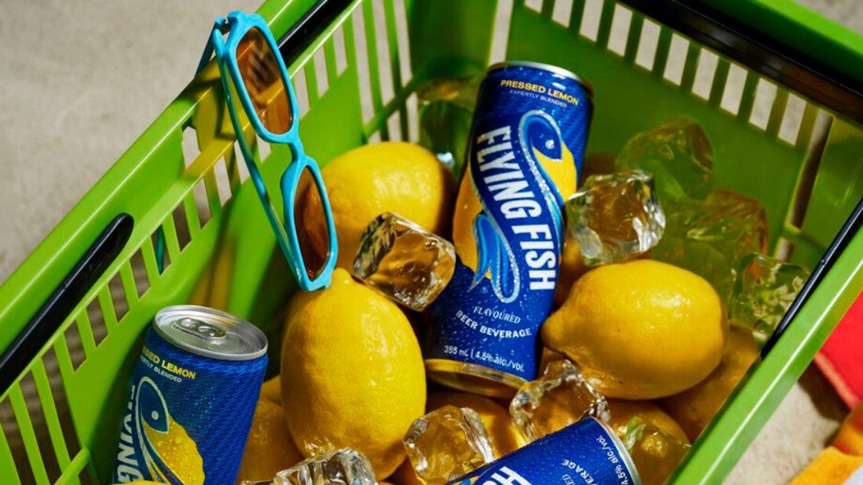 Flying Fish lemon beer cans with lemons and ice in basket