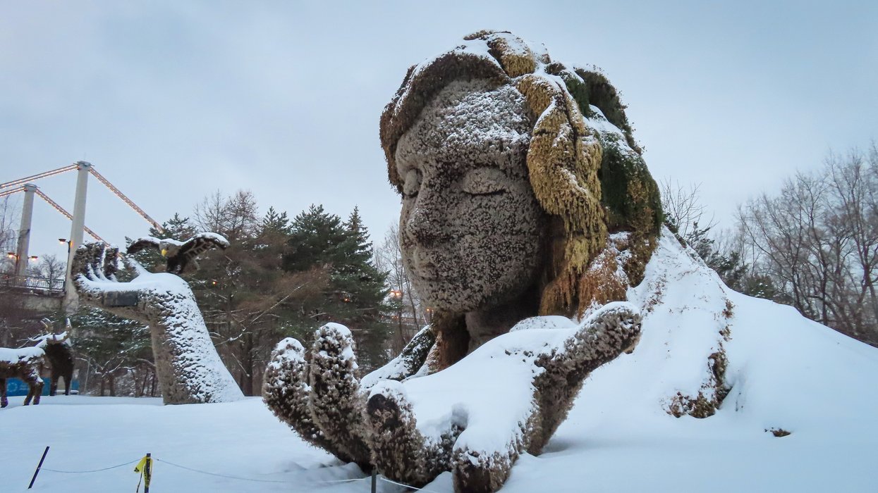 Giant Mother Earth sculpture covered in snow at Parc Jean-Drapeau Montreal.