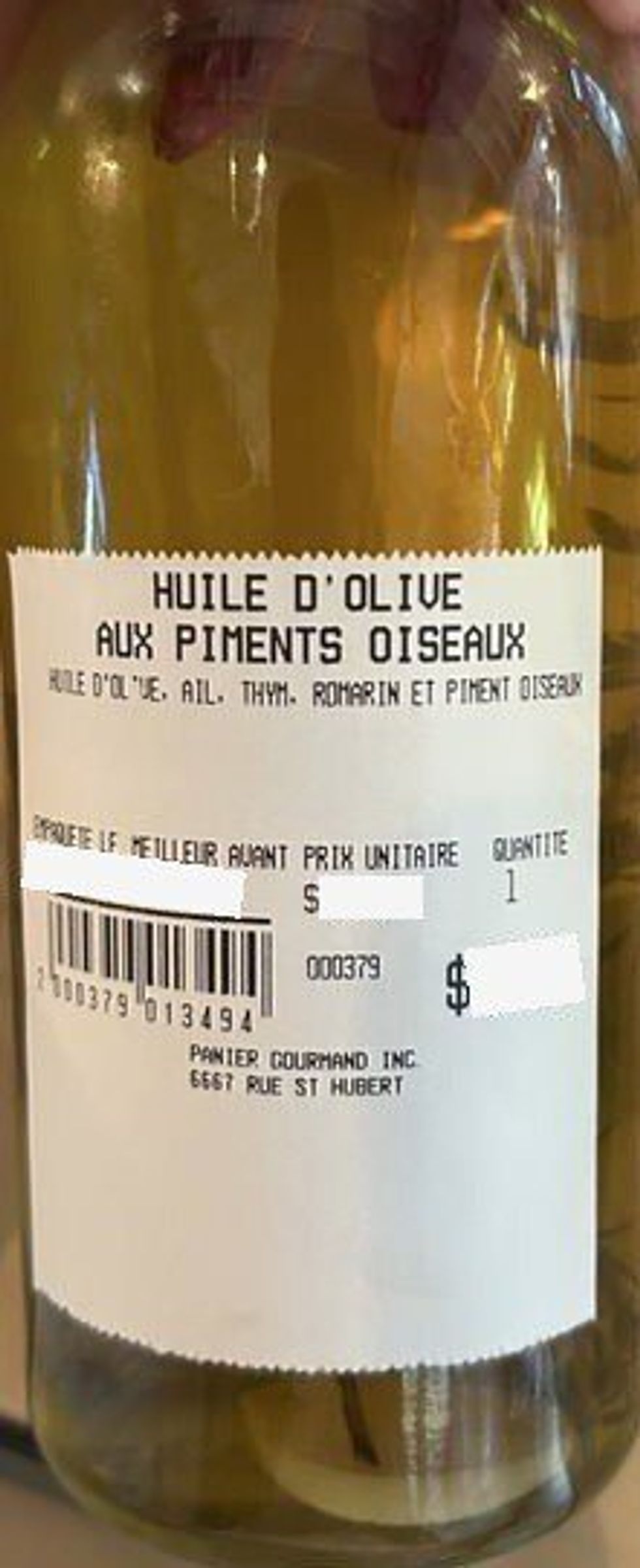 Glass jars of flavoured oils.