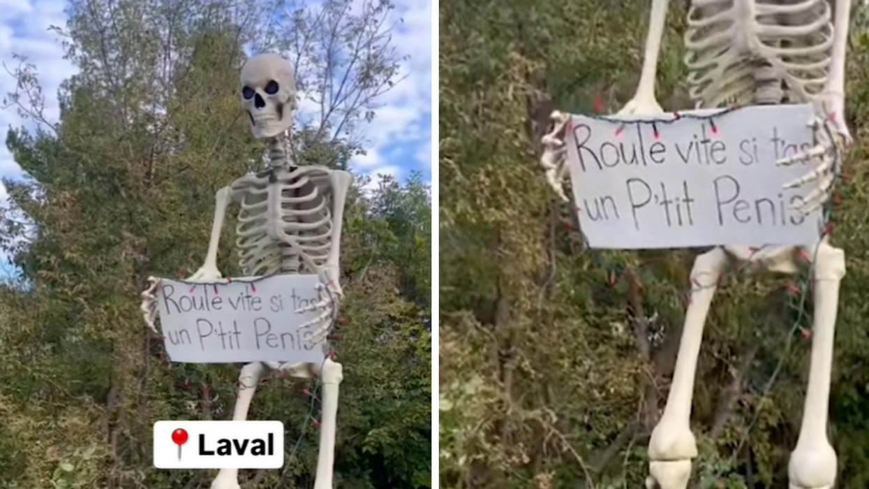 Halloween skeleton decoration holding a funny sign.