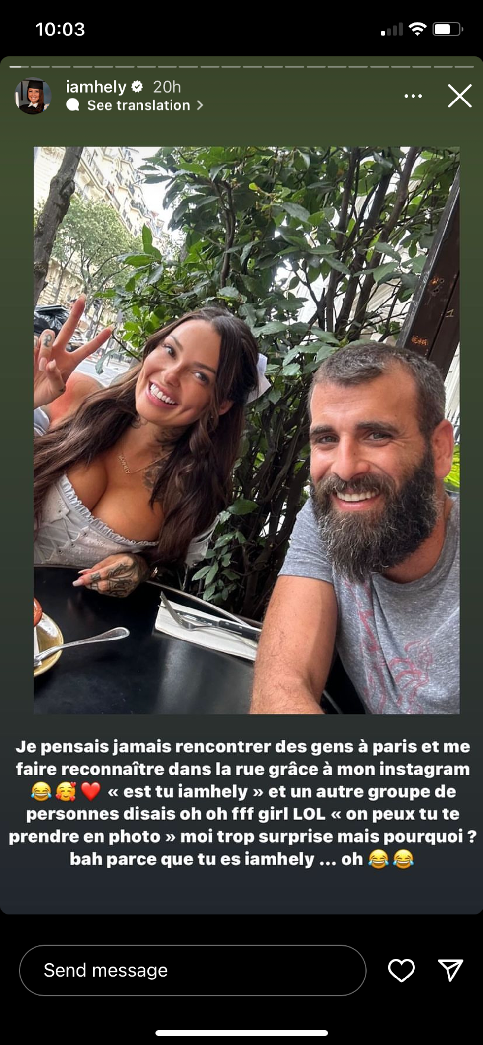 Helene Boudreau posing with a fan in Paris.