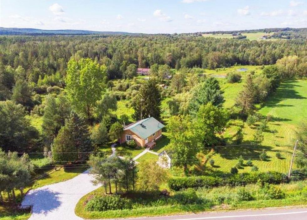 This 279,000 Home For Sale In Quebec Comes With 7+ Acres Of Land & A