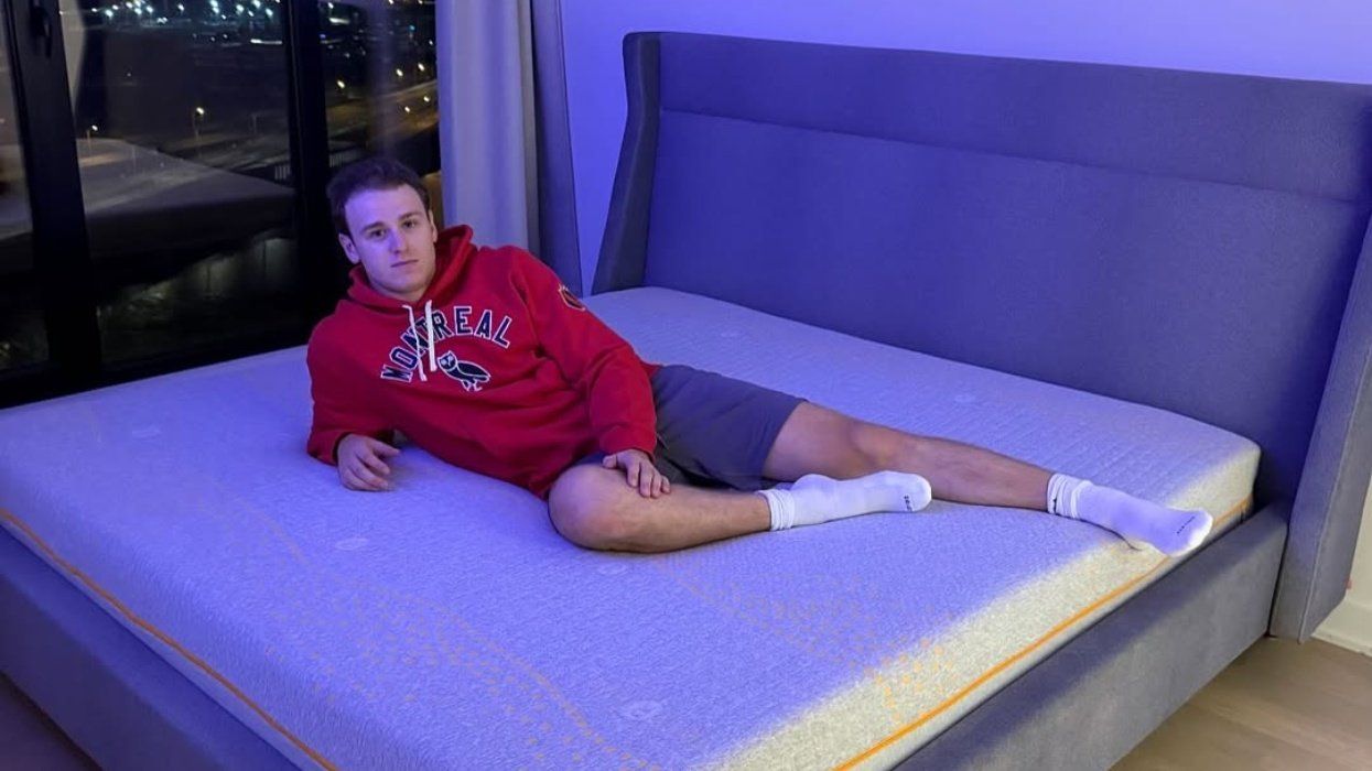 Jakub Dobes posing with a mattress.