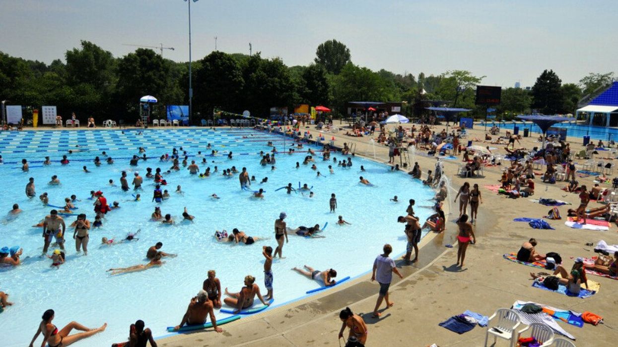 Lots of people cool off in and around the Parc Jean-Drapeau Aquatic Complex.