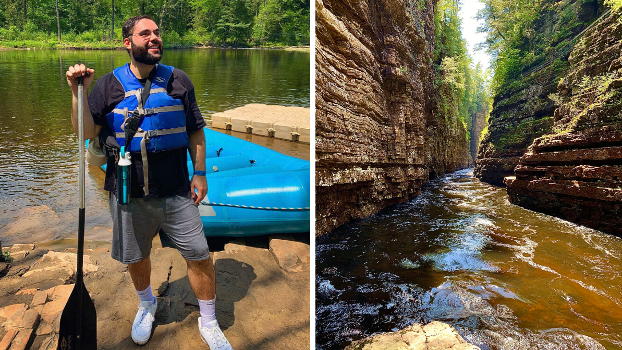 Man standing with rafting paddle at Ausable Chasm, Right: Ausable Chasm river.