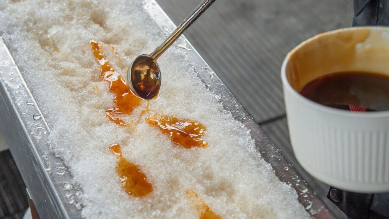 Maple taffy being poured on now at a sugar shack in Quebec.