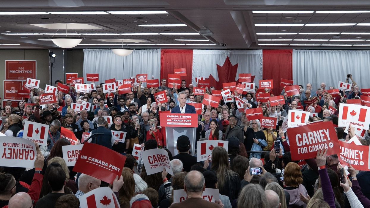 mark carney at an election campaign even with supporters
