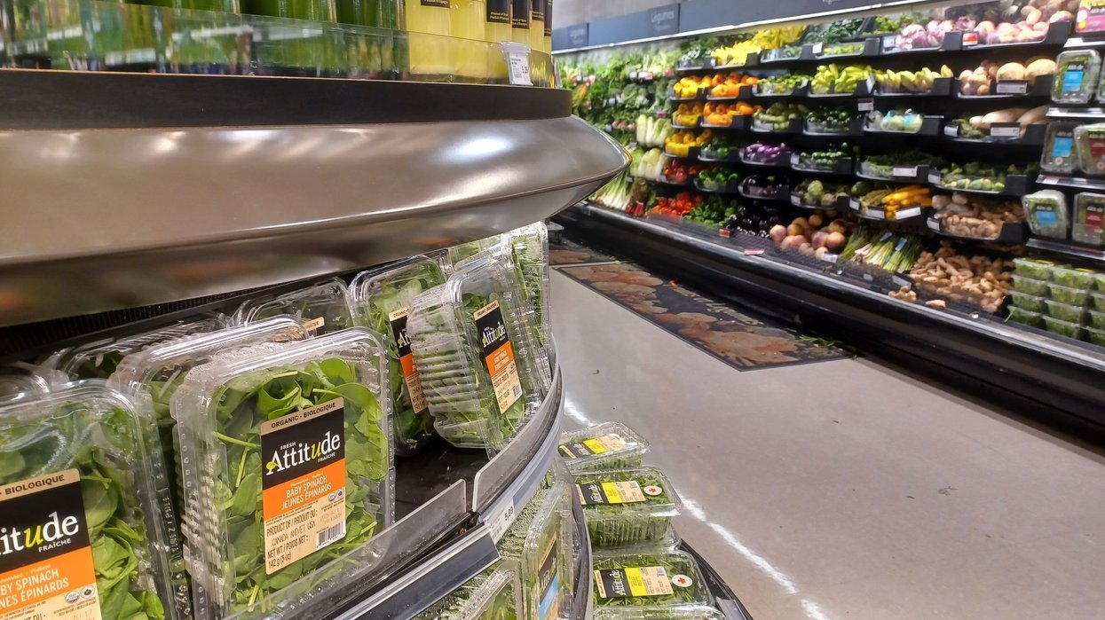 Metro grocery store inside view. Montreal, QC, Canada - August 1, 2025: A view down a wide, brightly lit aisle in a grocery store with shelves packed full of various food products