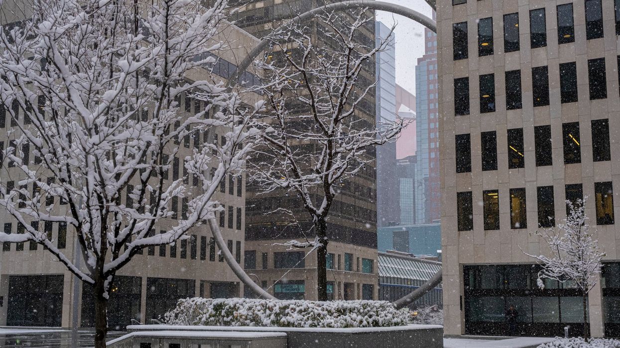 Montreal, Canada - 16 November 2022: Ring art piece in Downtown Montreal suring snow storm