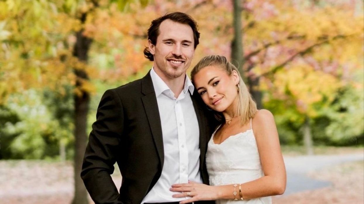 Montreal Canadiens player Brendan Gallagher posing with his stunning fiancé Emma Fortin while taking their engagement photos.