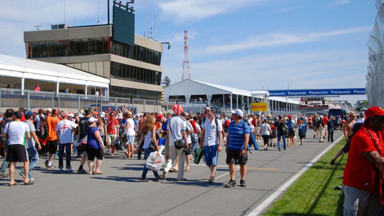 Montreal fans walk the track at the Canadian Grand Prix
