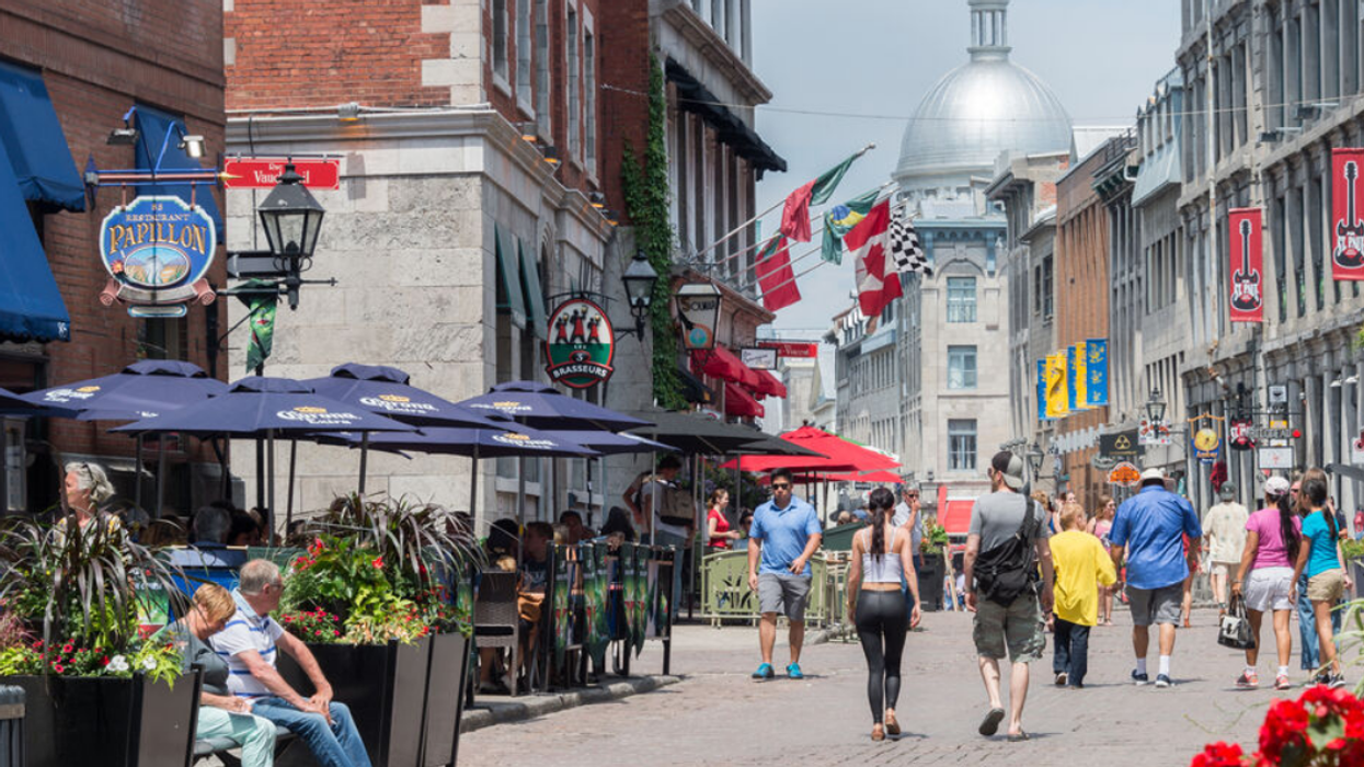 Montrealers walking through the Old Port in the summer.