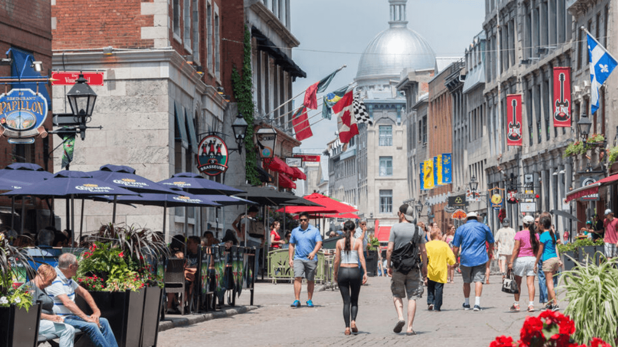 Montrealers walking through the Old Port in the summer.