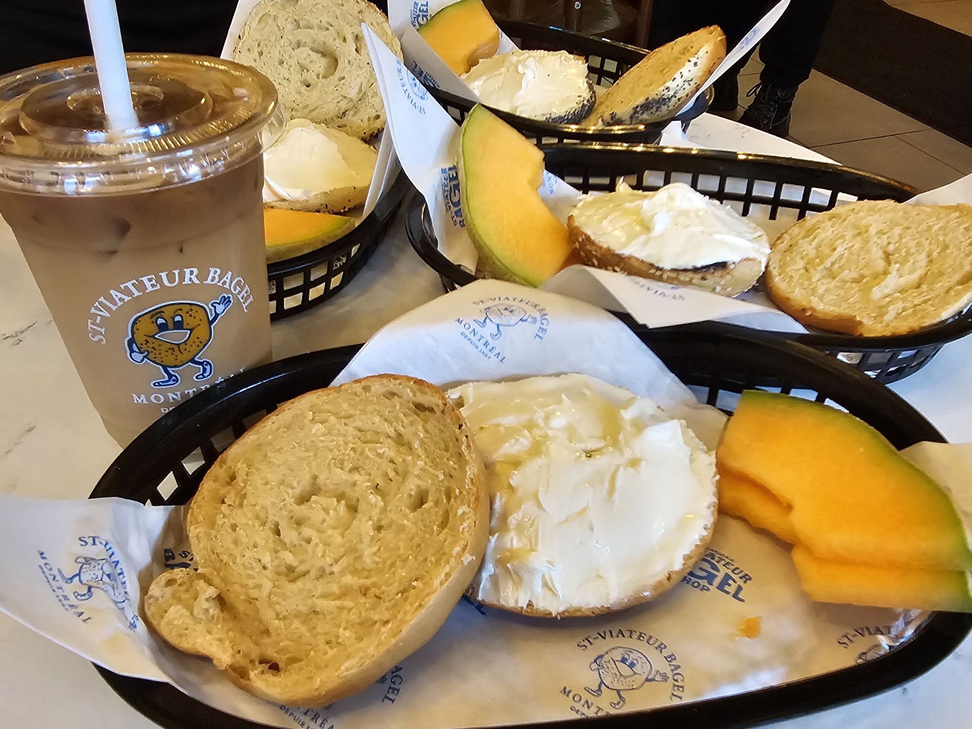 "No hole" bagels smeared with cream cheese.