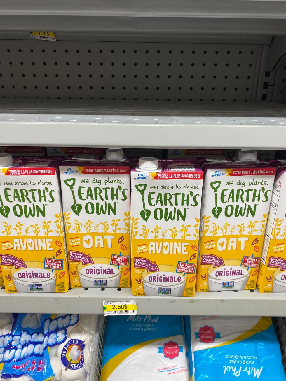 Oat milk on a shelf.