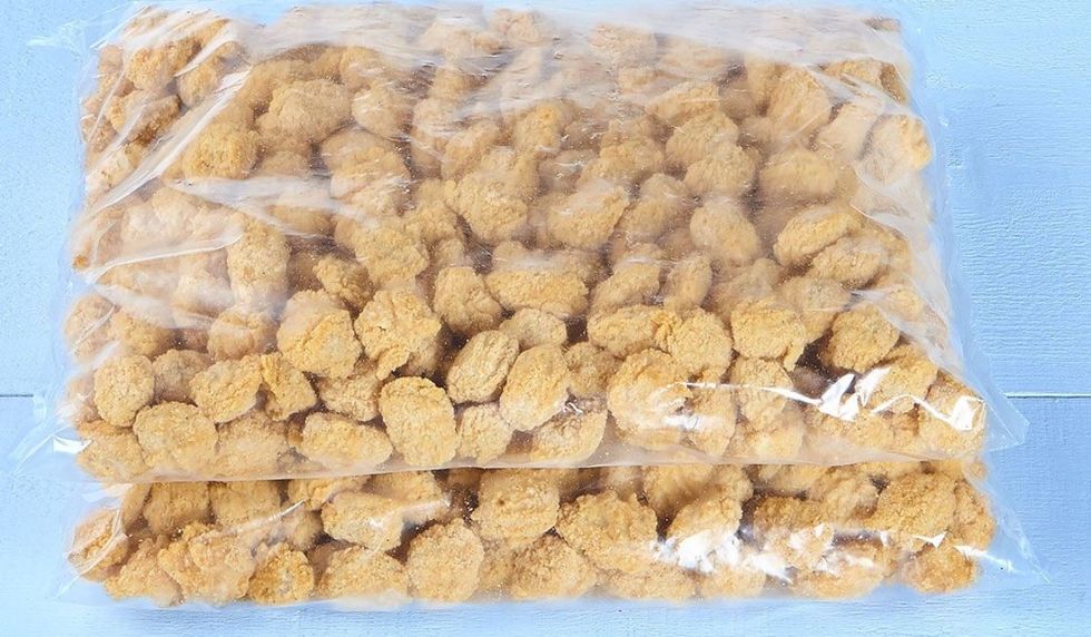 Palomitas de pollo Olymel, trozos de pollo empanizados, sazonados, completamente cocidos