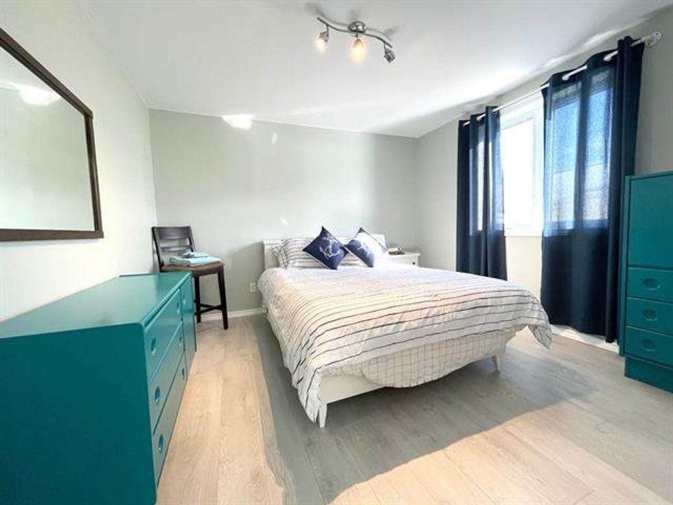 One of three bedrooms at 91, route Langlois.